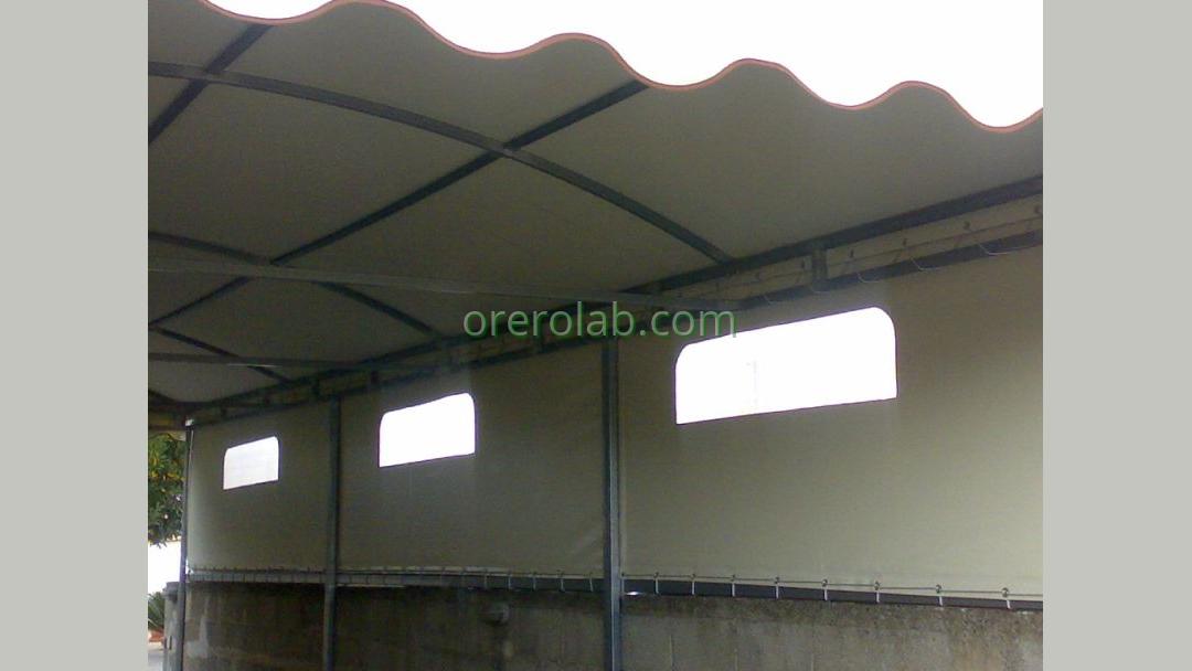 Soluzioni ombreggianti impermeabili in PVC ignifugo con occhielli veranda 8